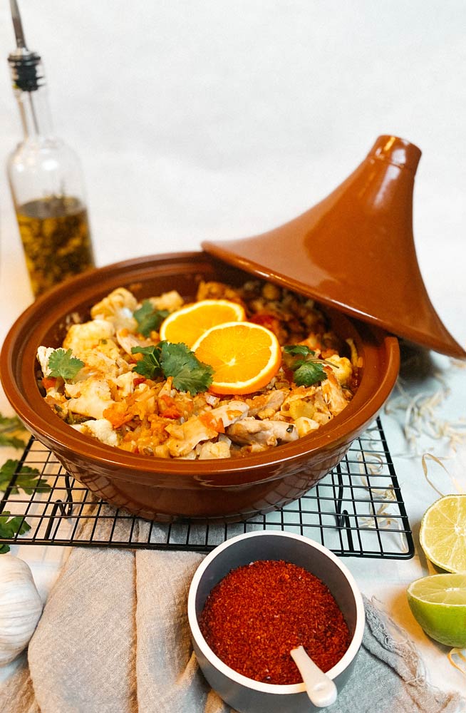 Kruidige kippendijen met bloemkool uit de tajine Health for wealth
